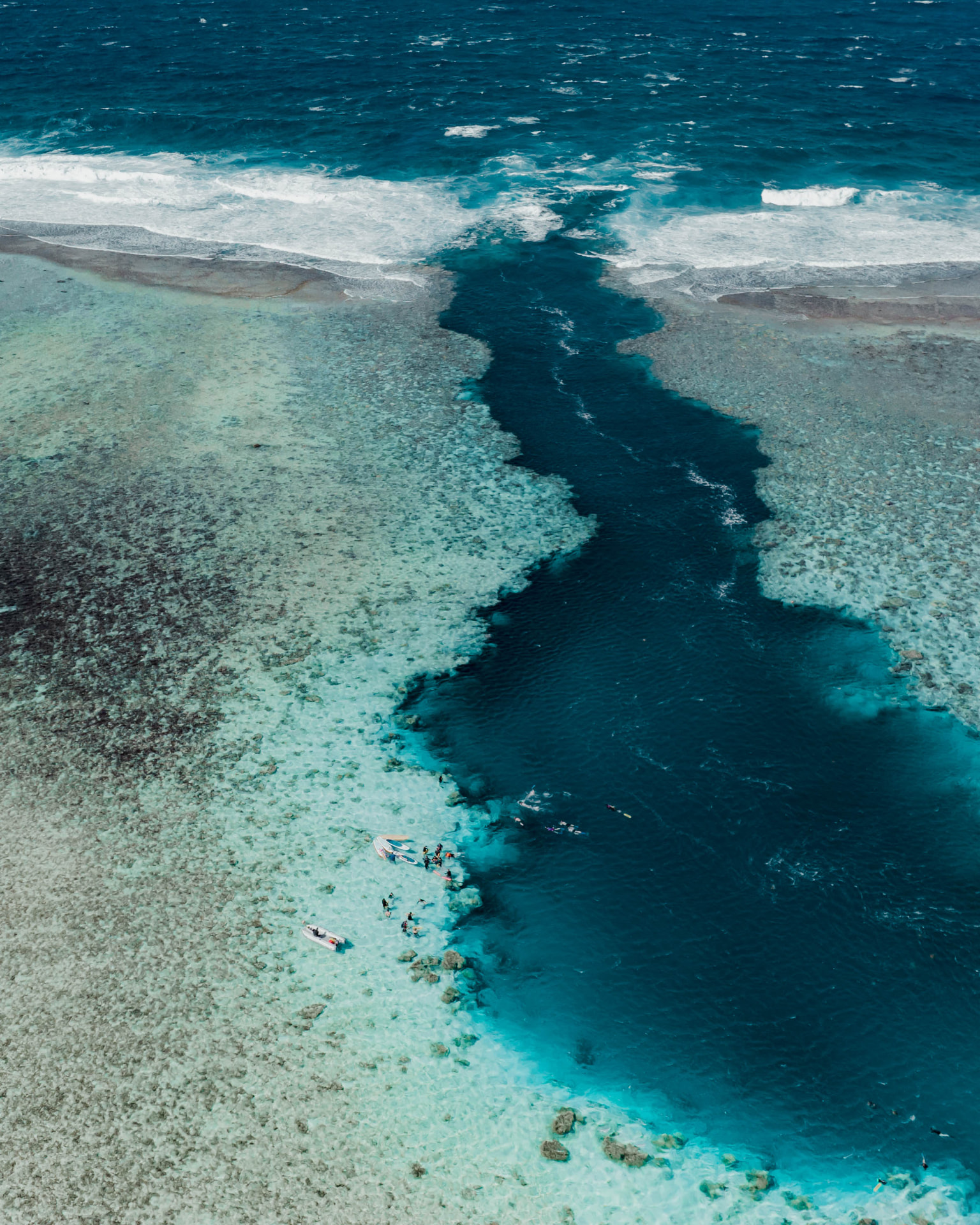 Aerial view of Rarotonga's reef, white sand and turquoise lagoon
