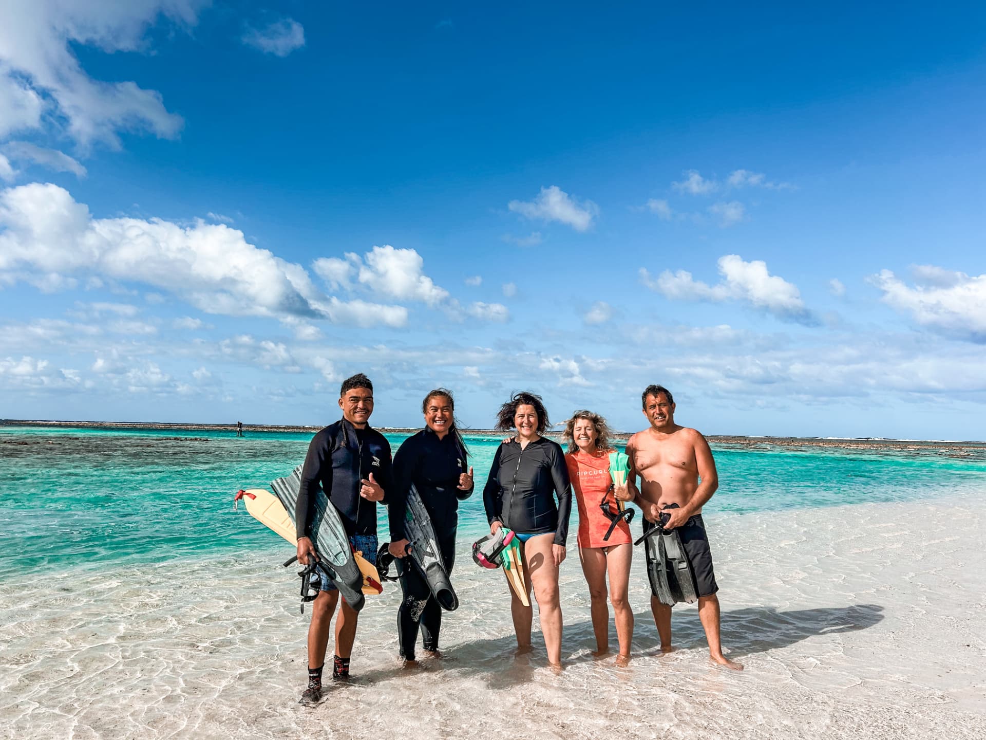 Sea Pace guides and guests on the beach after a turtle tour in Rarotonga